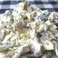 Сырный салат с сухариками и солеными огурцами