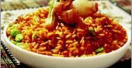 Полба в чугунной сковороде с куркумой