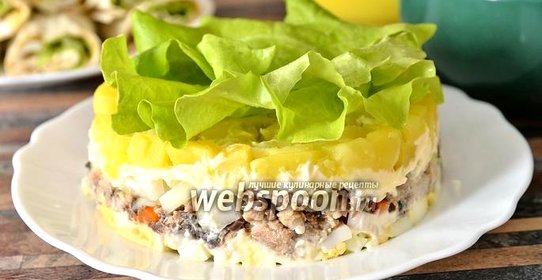 Салат с сардинами и кальмарами