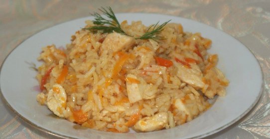Плов из курицы с помидорами
