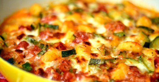 Кабачки, запеченные в духовке с овощами