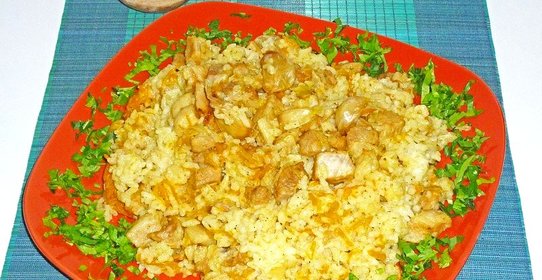 Плов из круглого риса на свинине с чесноком