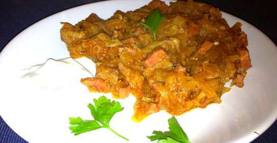 Тушеная капуста со свининой по‑польски