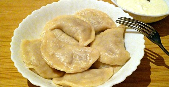 Вареники с тушеной капустой