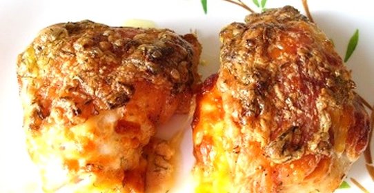 Куриные бедра в духовке с сыром
