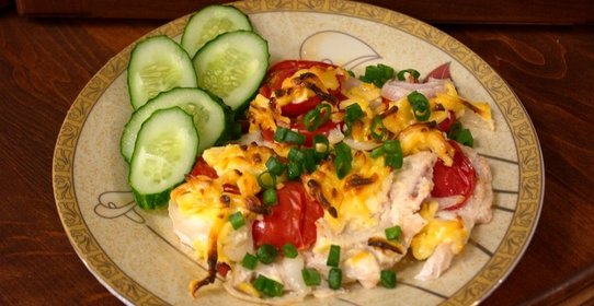 Отбивные в духовке с помидорами и сыром