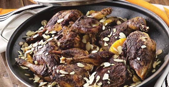 Фазан, тушенный с апельсинами и виноградным соком