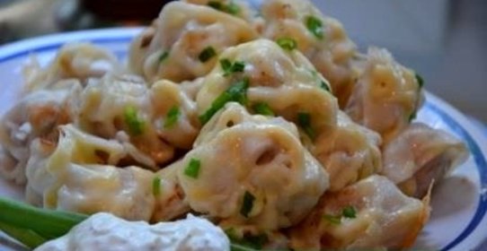 Пельмени жареные под сыром