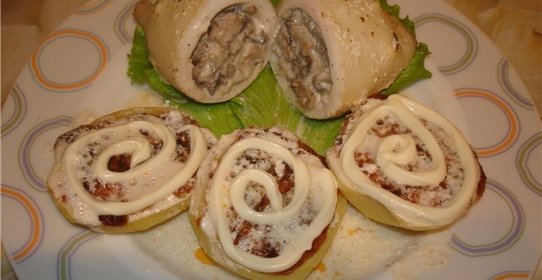 Кальмары, фаршированные рисом и грибами