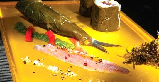 Маринованные сардины с виноградными листьями