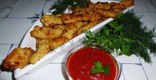 Кальмары в панировочных сухарях