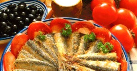 Сардины, запеченные с белым вином и панировочными сухарями