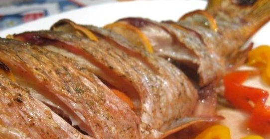 Карп в чесночном соусе