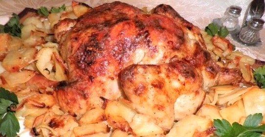 Курица, фаршированная картофелем