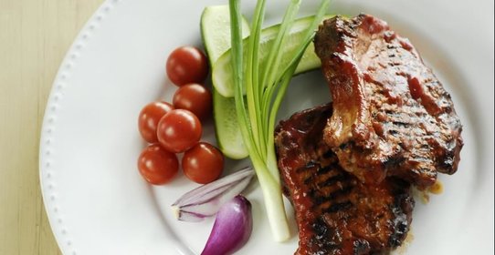 Свиные отбивные с апельсиновым соусом