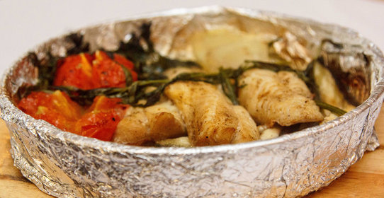 Рыба, запеченная с овощами