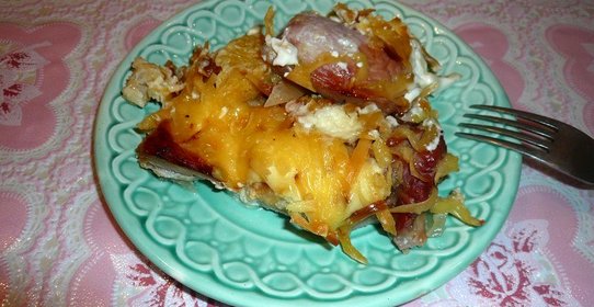 Свинина с апельсинами под сырной шубкой