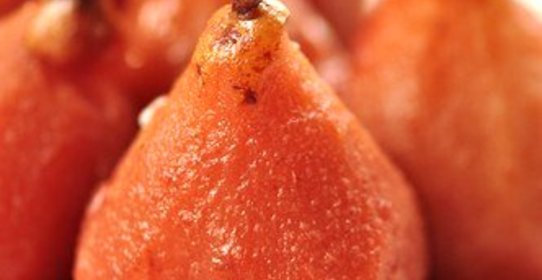 Груши с клюквой в медовом сиропе со специями