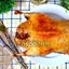 Утка запечённая с изюмом и чесноком