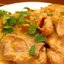 Кролик, тушенный с луком и морковью