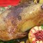 Гусь, запеченный с яблоками