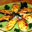 Мидии в ракушках, запеченные с сыром