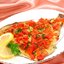 Камбала, запеченная с помидорами