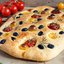 Фокачча с томатами, оливками и розмарином