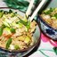 Жареный рис с креветками, овощами и яйцом в азиатском стиле
