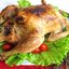 Курица запечённая с лимоном, чесноком и травами
