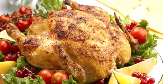 Курица, фаршированная овощами, в духовке