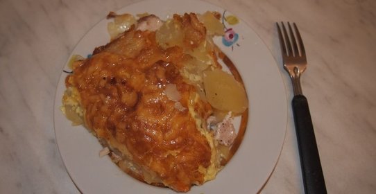 Индейка, запеченная с картофелем под сыром