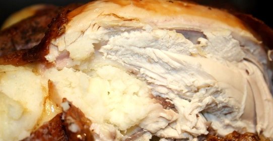 Курица, фаршированная картошкой в духовке