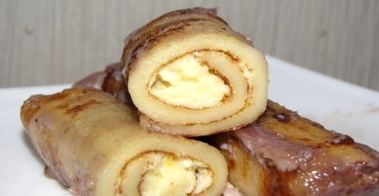 Блинчики с творогом, запеченные в сметане