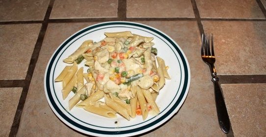 Курица в сметане с овощами