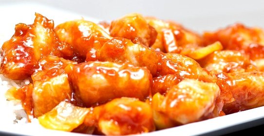 Курица в кисло-сладком соусе со сладким перцем и ананасами